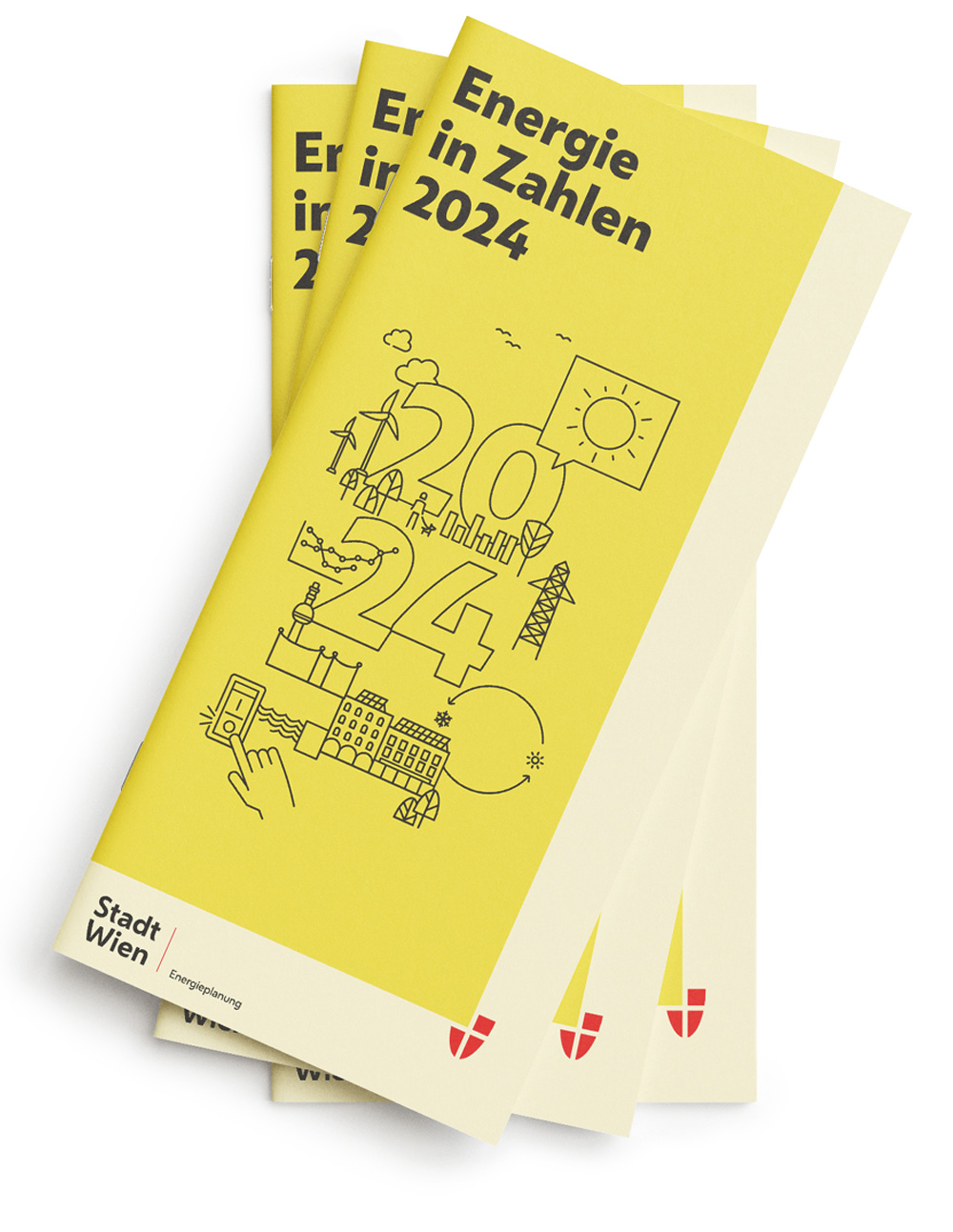 A stack of yellow pamphlets with energy-themed diagrams and German text.